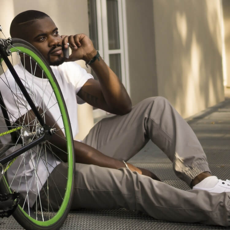 Photo of man with bike